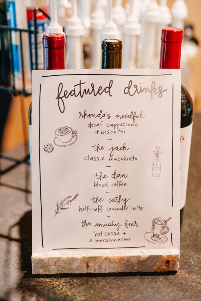 Handwritten signature coffee menu with custom drink names at a Montana wedding welcome event at 320 Ranch