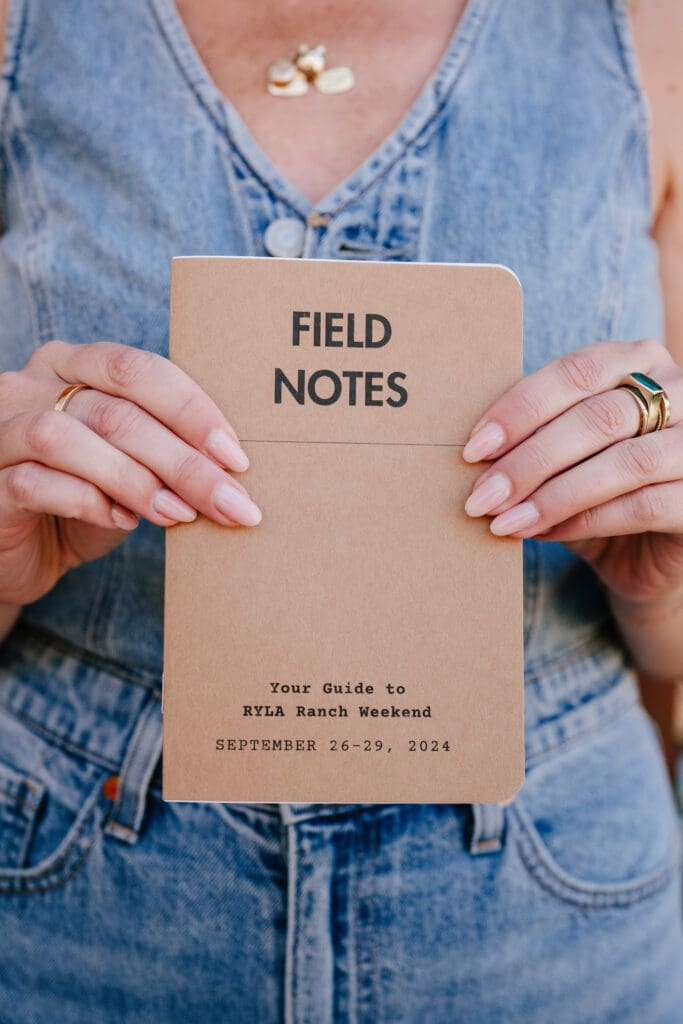 Custom Montana wedding weekend guide book designed like a Field Notes journal for a 320 Ranch destination wedding in Big Sky
